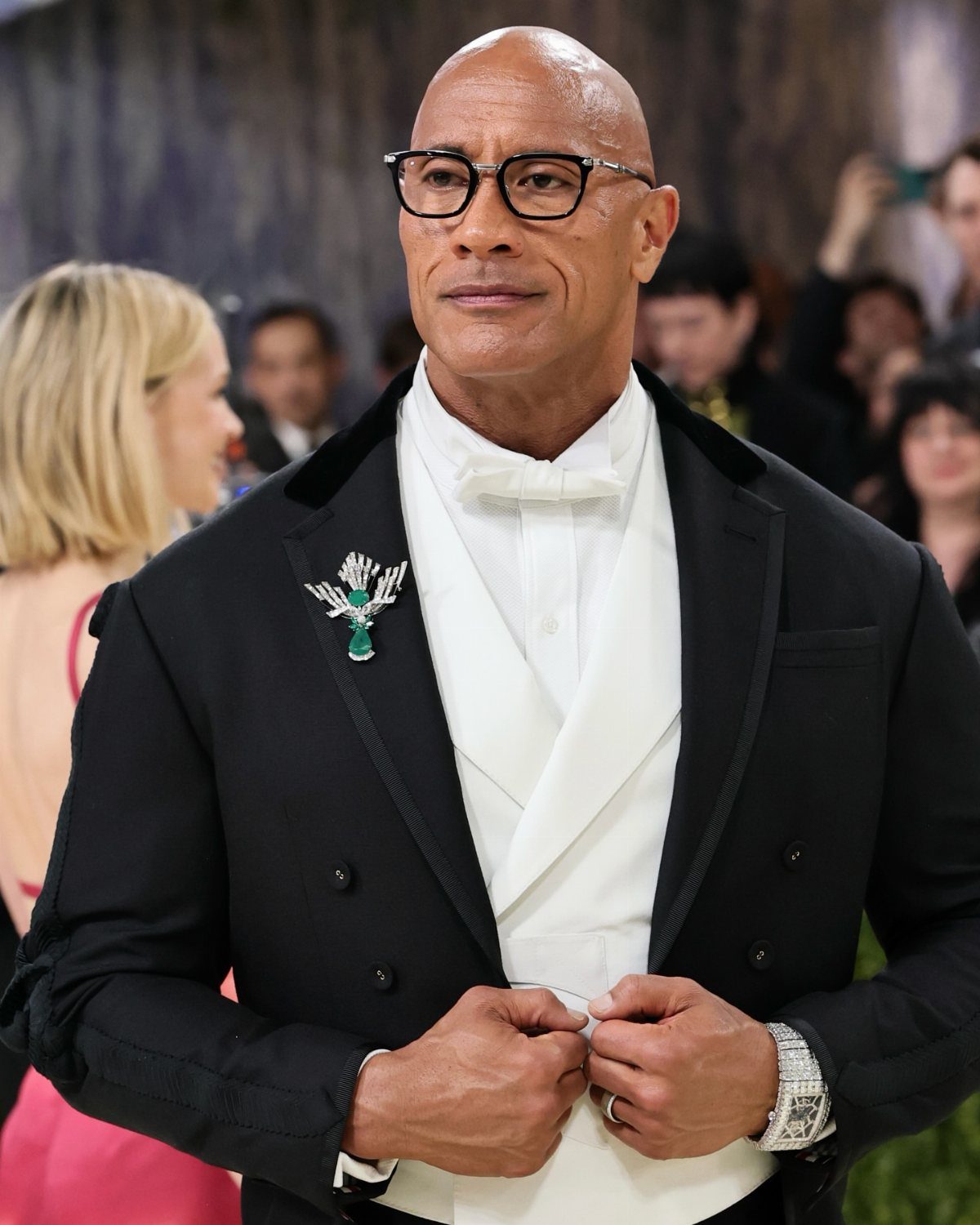 Dwayne Johnson in a black tuxedo and white bow tie at the Met Gala.